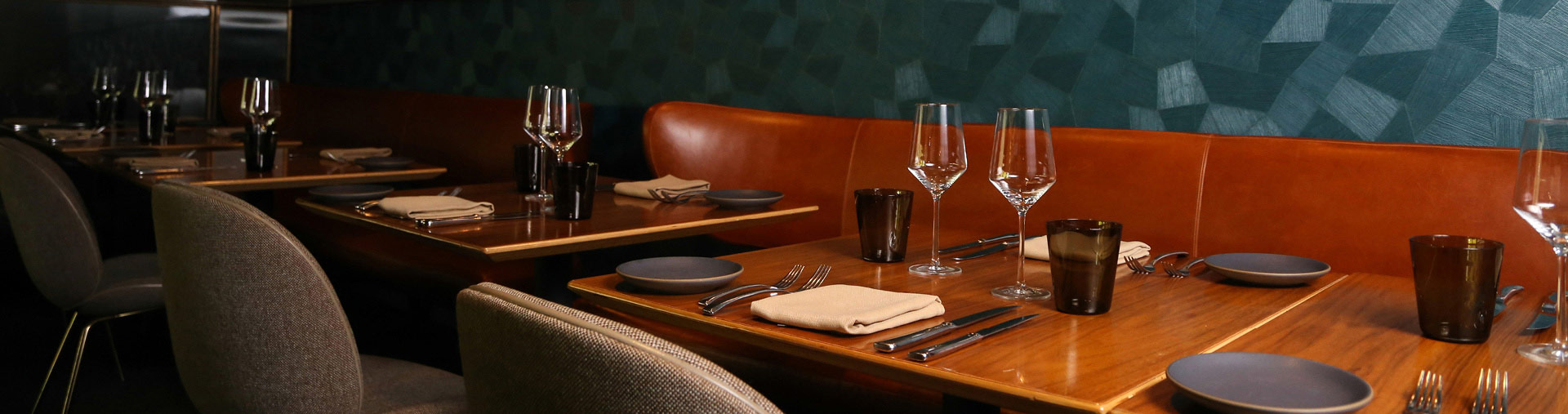 Dining table set for an event at Nick + Stef's Steakhouse in Los Angeles