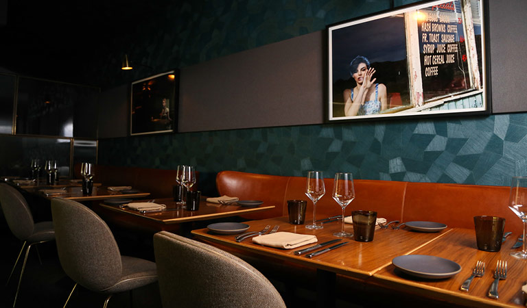 Dining table set for an event at Nick + Stef's Steakhouse in Los Angeles