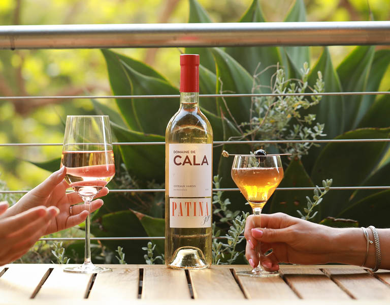Two wine glasses and a bottle of wine